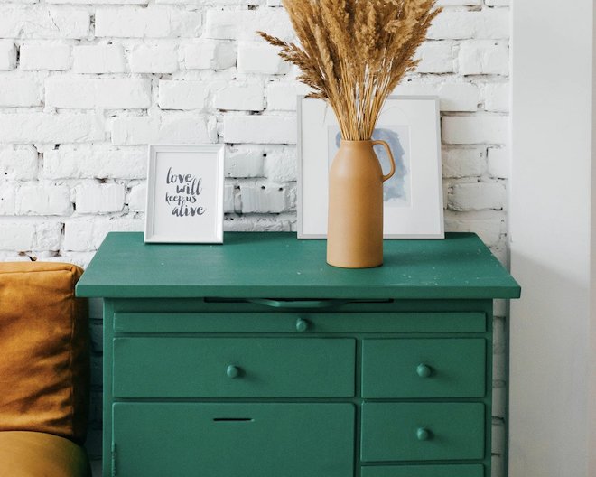 Drawer furniture with an ornament on top